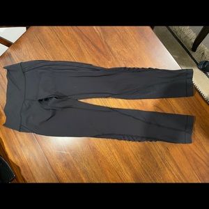 LULULEMON black leggings, mesh calves, size 10